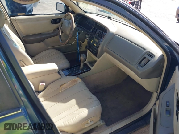 1998 Toyota Avalon XL with VIN 4T1BF18BXWU267131, listed as a IAAI auction lot 41518513 with 208,023 mi miles and . Bid and sale history available at DreamBid. Image 5.
