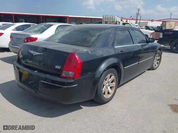 2006 Chrysler 300 Touring with VIN 2C3KA53G66H212129, listed as a IAAI auction lot 41868973 with 248,340 mi miles. Bid and sale history available at carsss.com. Image 4.