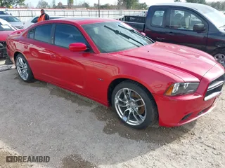 2011 Dodge Charger RT Plus with VIN 2B3CL5CT3BH512648, listed as a IAAI auction lot 41273976 with 185,560 mi miles. Bid and sale history available at carsss.com. Image 1.