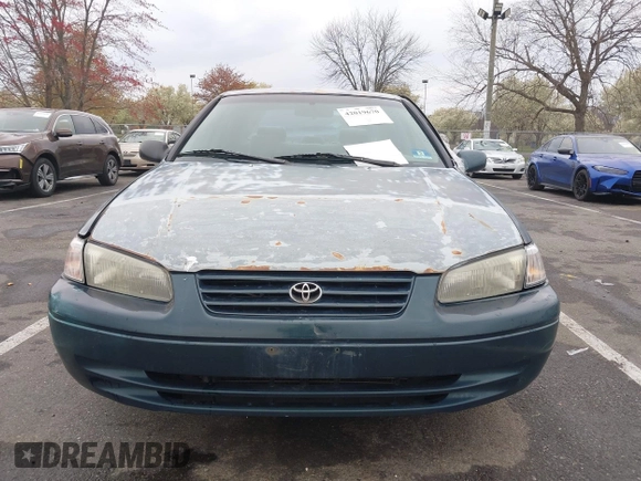 1997 Toyota Camry LE z VIN 4T1BG22K5VU024448, wystawiony jako IAAI lot #42019670 z przebiegiem 133 385 mil mil oraz . Historia ofert i sprzedaży dostępna na DreamBid. Obrazek 12.