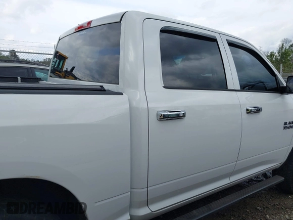 2015 Ram 1500 Tradesman with VIN 1C6RR7KG8FS648142, listed as a IAAI auction lot 41647459 with 100,696 mi miles and . Bid and sale history available at DreamBid. Image 13.