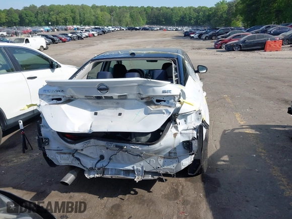 2020 Nissan Sentra SR z VIN 3N1AB8DV6LY290485, wystawiony jako IAAI lot #42082911 z przebiegiem 74 125 mil mil oraz . Historia ofert i sprzedaży dostępna na DreamBid. Obrazek 17.