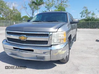 2013 Chevrolet Silverado 1500 LT with VIN 3GCPCSE01DG206827, listed as a IAAI auction lot 41976945 with 213,940 mi miles and . Bid and sale history available at DreamBid. Image 6.