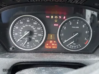 2011 BMW X5 35i with VIN 5UXZV4C58BL410570, listed as a IAAI auction lot 41886238 with 164,192 mi miles. Bid and sale history available at carsss.com. Image 7.