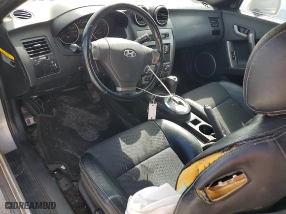 2008 Hyundai Tiburon GT with VIN KMHHN66F18U272205, listed as a Copart auction lot 71458634 with 114,960 mi miles and Salvage Title. Bid and sale history available at carsss.com. Image 8.