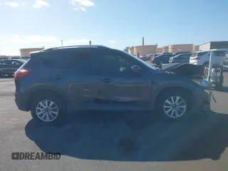 2014 Mazda CX-5 Sport with VIN JM3KE2BE4E0414721, listed as a IAAI auction lot 41408914 with Not Provided miles and . Bid and sale history available at carsss.com. Image 13.