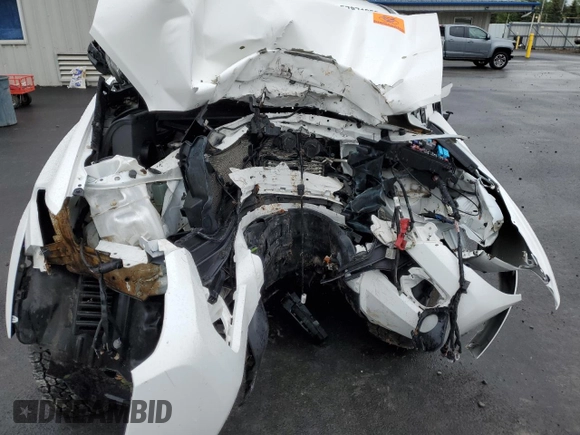 2020 Toyota Tacoma SR5 z VIN 3TMCZ5AN2LM339564, wystawiony jako Copart lot #57871255 z przebiegiem Nie podano mil oraz Szkoda całkowita • Salvage title. Historia ofert i sprzedaży dostępna na DreamBid. Obrazek 11.