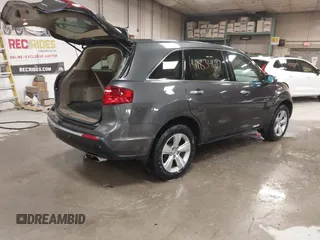 2010 Acura MDX Technology Pkg with VIN 2HNYD2H6XAH515333, listed as a IAAI auction lot 41834679 with 128,224 mi miles. Bid and sale history available at carsss.com. Image 4.