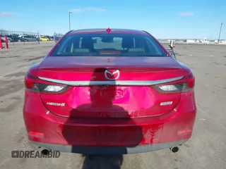 2016 Mazda 6 i Grand Touring with VIN JM1GJ1W51G1443203, listed as a IAAI auction lot 41247354 with 144,840 mi miles. Bid and sale history available at carsss.com. Image 16.