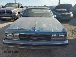 1987 Chevrolet El Camino z VIN 3GCCW80Z9HS905561, wystawiony jako Copart lot #75401604 z przebiegiem 32 958 mil mil oraz Szkody całkowita. Historia ofert i sprzedaży dostępna na DreamBid. Obrazek 5.