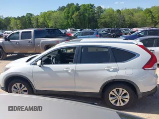 2014 Honda CR-V EX-L with VIN 5J6RM4H77EL028656, listed as a IAAI auction lot 42022965 with 100,329 mi miles. Bid and sale history available at carsss.com. Image 14.