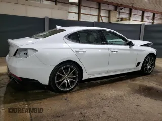 2023 Genesis G70 2.0T with VIN KMTG34TA9PU124418, listed as a Copart auction lot 60632694 with 23,798 mi miles and Salvage Title. Bid and sale history available at DreamBid. Image 3.