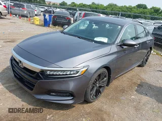 2019 Honda Accord Touring with VIN 1HGCV2F93KA022105, listed as a IAAI auction lot 42481791 with 41,940 mi miles and . Bid and sale history available at DreamBid. Image 2.