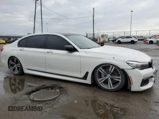 2017 BMW 7 Series 740i with VIN WBA7E2C3XHG741242, listed as a Copart auction lot 51577125 with 101,429 mi miles and Clean Title. Bid and sale history available at carsss.com. Image 4.