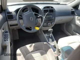 2007 Kia Spectra EX z VIN KNAFE122275474185, wystawiony jako Copart lot #55979575 z przebiegiem 122 776 mil mil oraz Szkody całkowita. Historia ofert i sprzedaży dostępna na DreamBid. Obrazek 8.