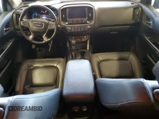 2022 GMC Canyon 4WD AT4 z VIN 1GTG6FEN0N1162393, wystawiony jako Copart lot #55286065 z przebiegiem 55 185 mil mil oraz Szkoda całkowita • Salvage title. Historia ofert i sprzedaży dostępna na DreamBid. Obrazek 8.