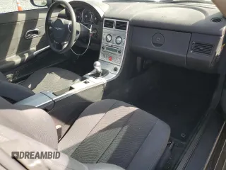 2005 Chrysler Crossfire z VIN 1C3AN59L15X033415, wystawiony jako Copart lot #72519304 z przebiegiem 38 198 mil mil oraz Szkoda całkowita • Salvage title. Historia ofert i sprzedaży dostępna na DreamBid. Obrazek 8.