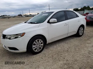 2010 Kia Forte EX with VIN KNAFU4A2XA5843209, listed as a Copart auction lot 74316334 with 144,433 mi miles and Salvage Title. Bid and sale history available at carsss.com. Image 1.