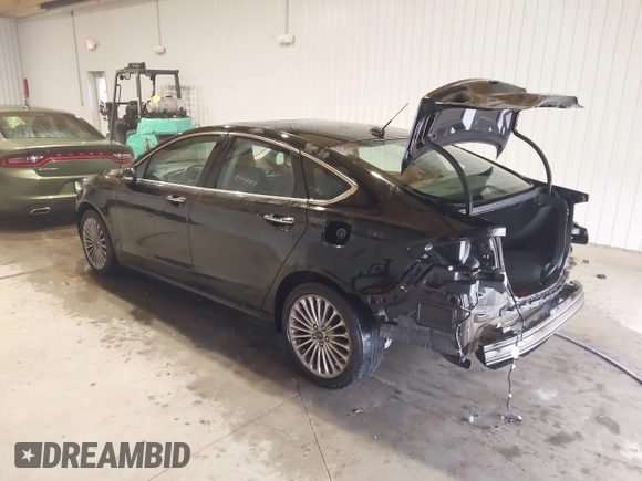 2016 Ford Fusion Titanium with VIN 3FA6P0K96GR197709, listed as a IAAI auction lot 40977902 with 135,259 mi miles. Bid and sale history available at carsss.com. Image 3.