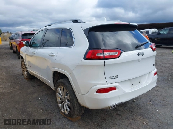 2017 Jeep Cherokee Overland z VIN 1C4PJMJS9HW631941, wystawiony jako IAAI lot #41605184 z przebiegiem 19 162 mil mil oraz . Historia ofert i sprzedaży dostępna na DreamBid. Obrazek 3.
