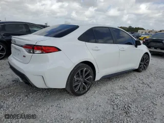 2022 Toyota Corolla SE with VIN 5YFS4MCE5NP125472, listed as a Copart auction lot 50824905 with 27,009 mi miles and Clean Title. Bid and sale history available at carsss.com. Image 3.