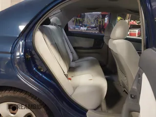 2004 Kia Spectra LX with VIN KNAFE121145012249, listed as a IAAI auction lot 42032571 with 146,748 mi miles. Bid and sale history available at carsss.com. Image 8.
