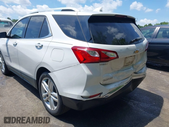 2019 Chevrolet Equinox Premier z VIN 2GNAXNEV2K6116643, wystawiony jako IAAI lot #42447904 z przebiegiem 44 786 mil mil oraz . Historia ofert i sprzedaży dostępna na DreamBid. Obrazek 17.
