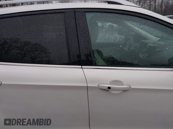 2014 Ford Escape Titanium with VIN 1FMCU9J94EUD49614, listed as a IAAI auction lot 42005864 with 87,779 mi miles. Bid and sale history available at carsss.com. Image 13.