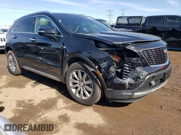 2021 Cadillac XT4 AWD Premium Luxury with VIN 1GYFZDR41MF002835, listed as a Copart auction lot 49384424 with 9,984 mi miles and Salvage Title. Bid and sale history available at carsss.com. Image 4.