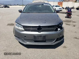 2013 Volkswagen Jetta SE with VIN 3VWDP7AJ5DM355176, listed as a Copart auction lot 60324525 with 192,226 mi miles and Salvage title. Bid and sale history available at DreamBid. Image 5.