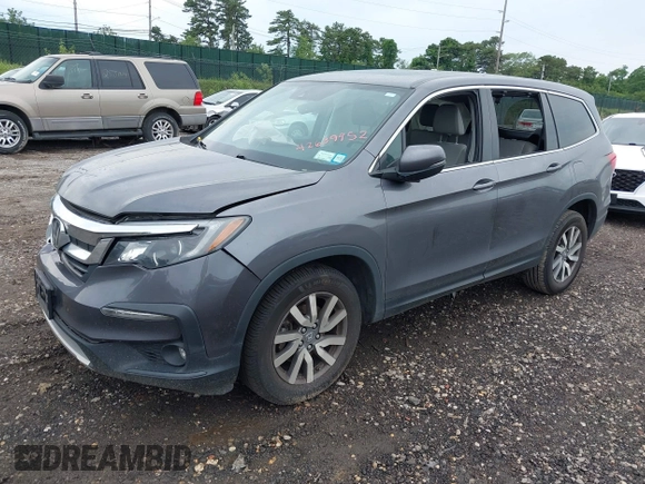 2019 Honda Pilot EX-L with VIN 5FNYF6H5XKB096065, listed as a IAAI auction lot 42631239 with 171,768 mi miles and . Bid and sale history available at DreamBid. Image 17.