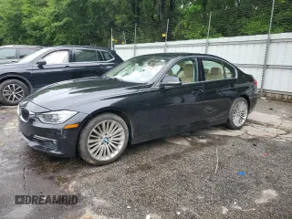 2014 BMW 3 Series 328i with VIN WBA3C1C5XEK105543, listed as a Copart auction lot 58548015 with 156,721 mi miles and Salvage title. Bid and sale history available at DreamBid. Image 1.