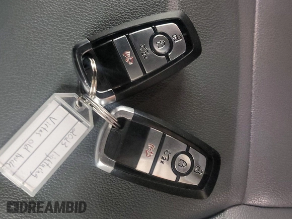 2023 Ford F-150 Lightning Pro z VIN 1FTVW1EL0PWG02840, wystawiony jako IAAI lot #42379448 z przebiegiem 52 710 mil mil oraz . Historia ofert i sprzedaży dostępna na DreamBid. Obrazek 9.