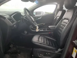 2019 Ford Edge SEL with VIN 2FMPK4J92KBB34891, listed as a Copart auction lot 60050945 with 104,942 mi miles and Salvage title. Bid and sale history available at DreamBid. Image 7.