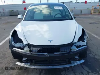2023 Tesla Model 3 with VIN 5YJ3E1EA6PF495631, listed as a IAAI auction lot 41568118 with 10,073 mi miles and . Bid and sale history available at DreamBid. Image 13.