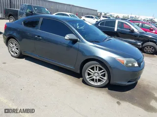 2007 Scion tC Spec with VIN JTKDE177170180779, listed as a IAAI auction lot 41987327 with 243,427 mi miles. Bid and sale history available at carsss.com. Image 1.