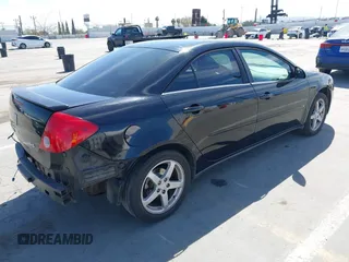 2006 Pontiac G6 6-Cyl with VIN 1G2ZG558964261910, listed as a IAAI auction lot 42028627 with 149,703 mi miles. Bid and sale history available at carsss.com. Image 4.