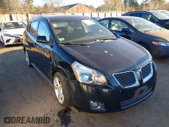 2009 Pontiac Vibe with VIN 5Y2SM67059Z417404, listed as a IAAI auction lot 40857104 with 172,676 mi miles. Bid and sale history available at carsss.com. Image 1.