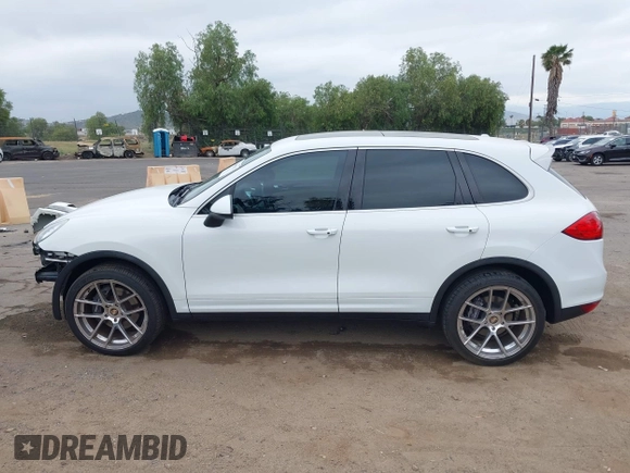2014 Porsche Cayenne with VIN WP1AA2A27ELA09019, listed as a IAAI auction lot 42068012 with 77,997 mi miles and . Bid and sale history available at DreamBid. Image 15.