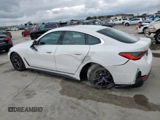 2024 BMW i4 eDrive35 with VIN WBY43AW08RFS83004, listed as a Copart auction lot 50818335 with 12,000 mi miles and Salvage Title. Bid and sale history available at carsss.com. Image 2.