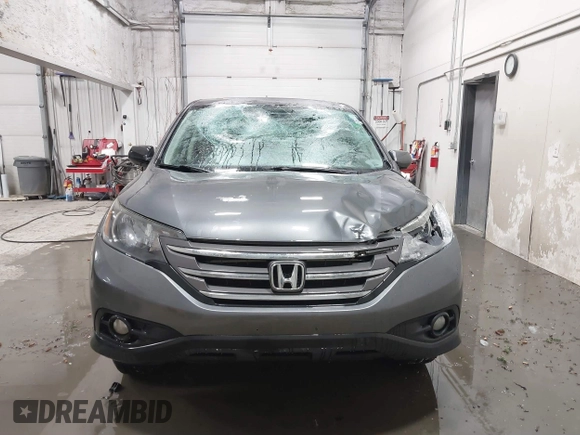 2013 Honda CR-V EX with VIN 2HKRM4H59DH682484, listed as a IAAI auction lot 41504589 with 208,260 mi miles and . Bid and sale history available at DreamBid. Image 12.