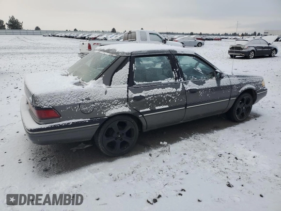 1990 Ford Tempo с VIN 1FAPP36X4LK167346, выставлен на аукционе Copart как лот 84089494 с пробегом 66 291 миль миль и Списание • Salvage title. История ставок и продаж доступна на DreamBid. Изображение 3.