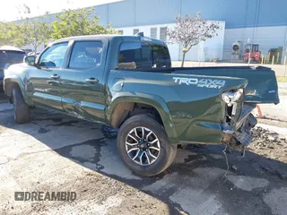 2021 Toyota Tacoma SR with VIN 3TMCZ5AN7MM395940, listed as a IAAI auction lot 41240832 with 39,338 mi miles and . Bid and sale history available at DreamBid. Image 3.