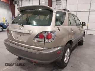 2002 Lexus RX 300 with VIN JTJHF10U720268702, listed as a IAAI auction lot 42160983 with 332,199 mi miles. Bid and sale history available at carsss.com. Image 4.