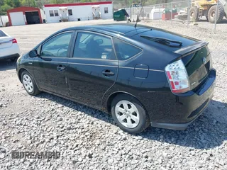 2008 Toyota Prius with VIN JTDKB20UX87703593, listed as a IAAI auction lot 42108567 with 157,117 mi miles. Bid and sale history available at carsss.com. Image 3.