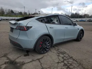 2022 Tesla Model Y Performance with VIN 7SAYGDEF2NF416730, listed as a Copart auction lot 47657945 with 40,738 mi miles and Salvage Title. Bid and sale history available at DreamBid. Image 3.