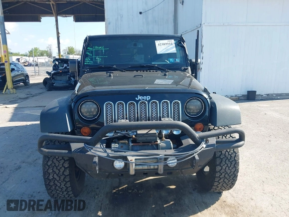 2013 Jeep Wrangler Unlimited Sport z VIN 1C4HJWDG9DL510121, wystawiony jako IAAI lot #42389944 z przebiegiem 84 390 mil mil oraz . Historia ofert i sprzedaży dostępna na DreamBid. Obrazek 12.