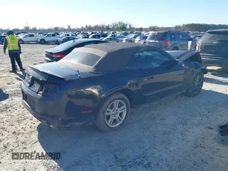 2014 Ford Mustang V6 with VIN 1ZVBP8EM2E5322709, listed as a IAAI auction lot 41732809 with 130,263 mi miles. Bid and sale history available at carsss.com. Image 4.