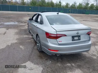 2019 Volkswagen Jetta GLI S with VIN 3VW5T7BU9KM157755, listed as a IAAI auction lot 42000718 with 121,015 mi miles and . Bid and sale history available at DreamBid. Image 3.