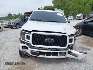 2018 Ford F-150 XL z VIN 1FTFW1E57JKF55049, wystawiony jako IAAI lot #42099491 z przebiegiem 159 170 mil mil oraz . Historia ofert i sprzedaży dostępna na DreamBid. Obrazek 13.